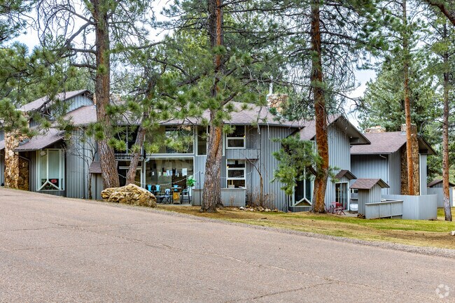 Late 20th-century townhomes and condos are clustered on the north side of Hiwan Estates and Fairway.