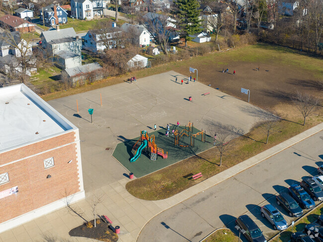 Students enjoy playing outside on the playground for recess.