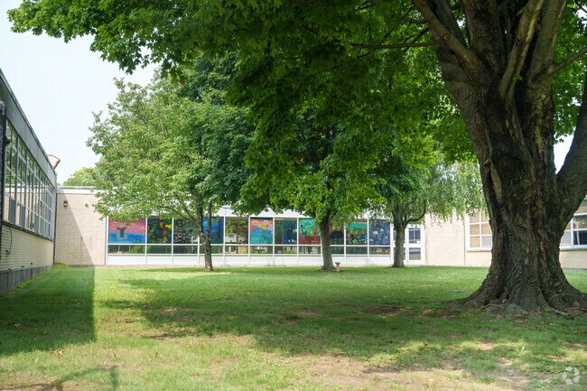Murals cover the windows in this section of Paxon Hollow Middle School.