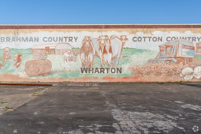 A vibrant mural in Wharton captures the city's rich country heritage.