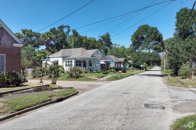 A row of homes in Fisher Alabama with its mature trees and wide streets.