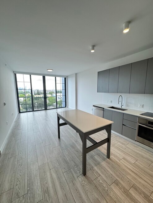 111 NW 27th St unit A1, Miami, FL 33127 - photo 1