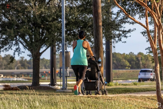 Families enjoy working out in the early morning in the Roman Forest neighborhood.