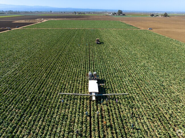 Farmers cultivate the land to bring in fresh crops in Salinas.