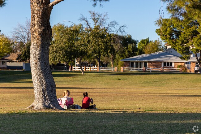 Chaparral Park has large shade trees and wide open fields for kids to enjoy.