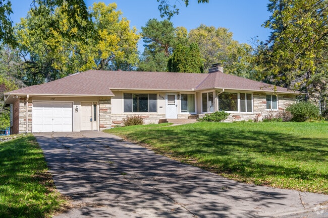 A Rambler-style home on a hill in the city of Highland Park.