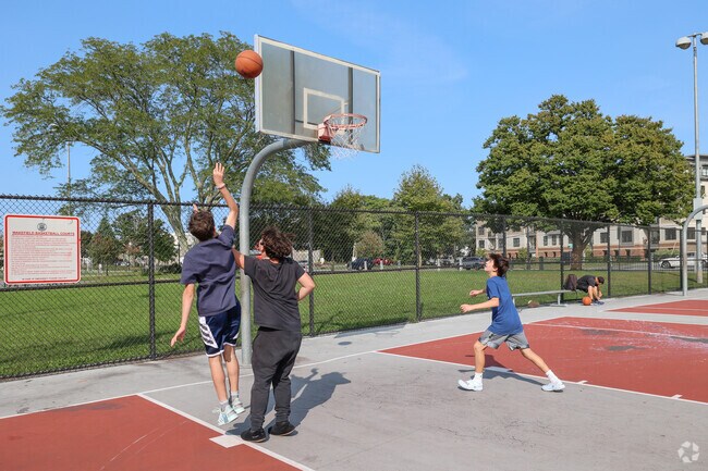 Students play basketball after school at Wakefield's Galvin Middle School.