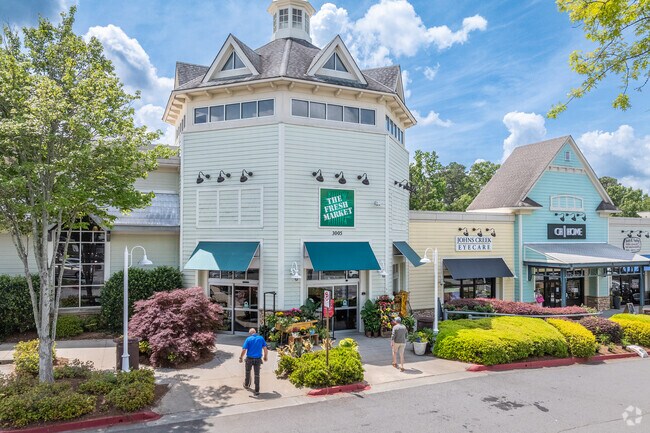 Boutique stores and casual eateries provide shopping and dining options near the Nesbit Lakes community.