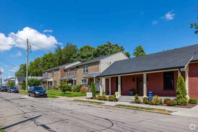 Newly renovated brick homes sit next to homes that share walls in Greater East End-Kenwick.