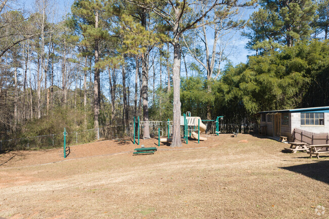 Covered Bridge Academy's campus comes equipped with various play areas.