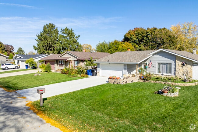 Ranch homes along Georgetown's side streets usually have a gabled roof above their front door.