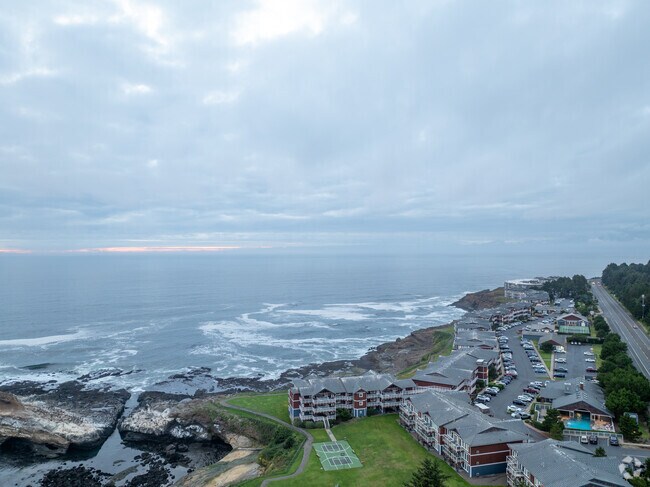 Condos sit on the edge of the coast line offering beautiful views to its residents.