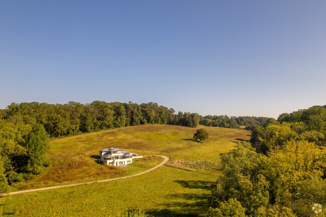 This home in Ashland lies on an enormous piece of land with plenty of open space.