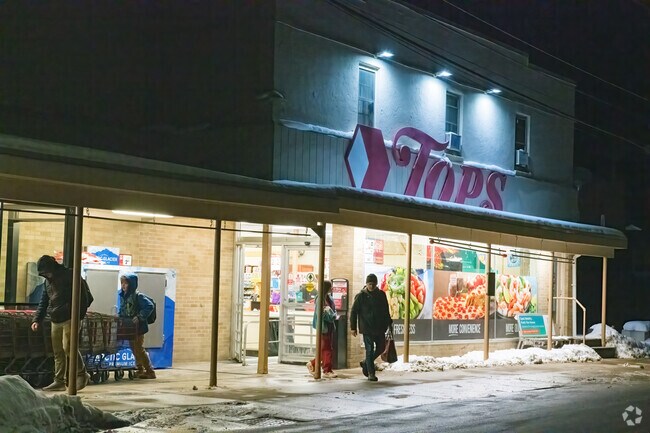 Downtown Frewsburg features Tops Friendly Markets for convenient grocery shopping, enhancing small-town living in Chautauqua County.