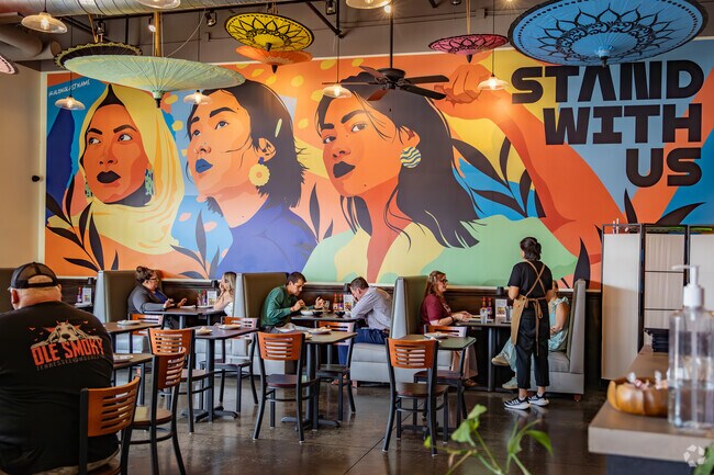 Residents eat at Chimm a Thai and Southeast Asian restaurant near Ridge Street.