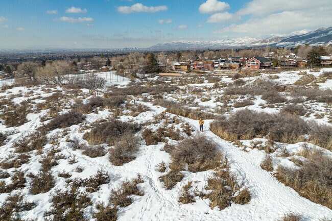 Residents can hike with scenic mountain views in East Millcreek's parks and trails.