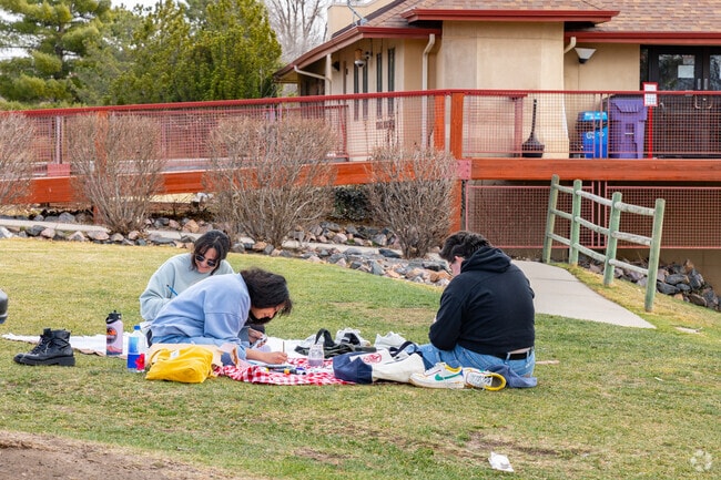 Enjoy a picnic on the grassy field at Harvard Gulch Park.