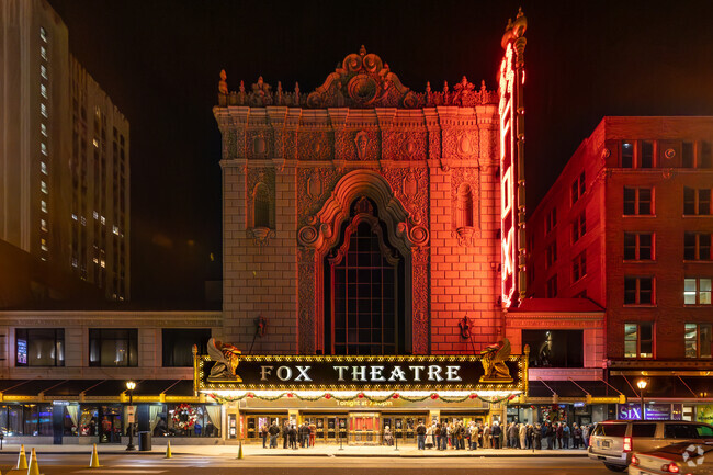 At night, The Fabulous Fox Theater glows red in Grand Center.