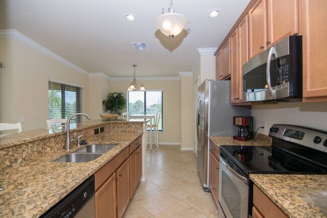 9837 Venezia Cir unit FL2-ID1049682P, Naples, FL 34113 - photo 5