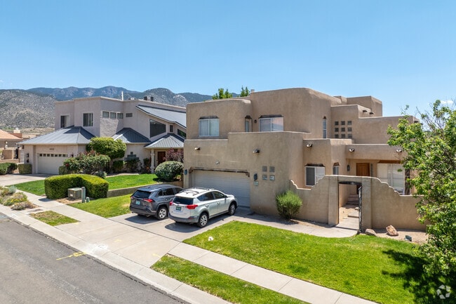 Explore the attractive design of new traditional homes with brick and Pueblo accents in John B Robert.