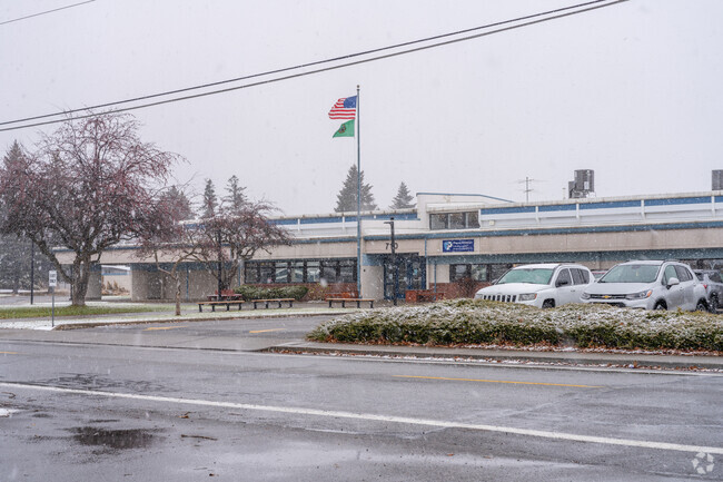Progress Elementary features a wide single story brick building.