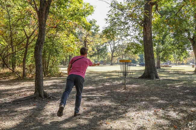 Wind your way through the trees at Blackhawk disc golf course near Xyler.