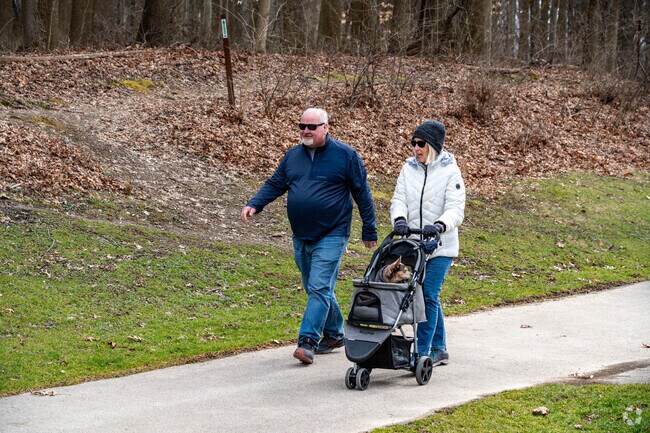 Paved trails at Bridal Veil Falls in Walton Hills attract families.