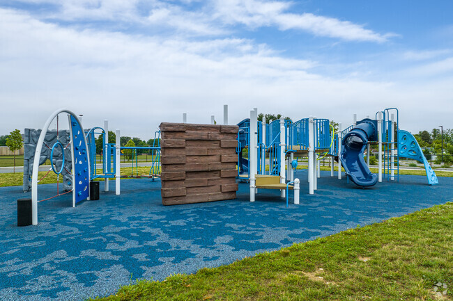 Gilpin Manor Elementary School features a bright blue playground for students in Elkton.