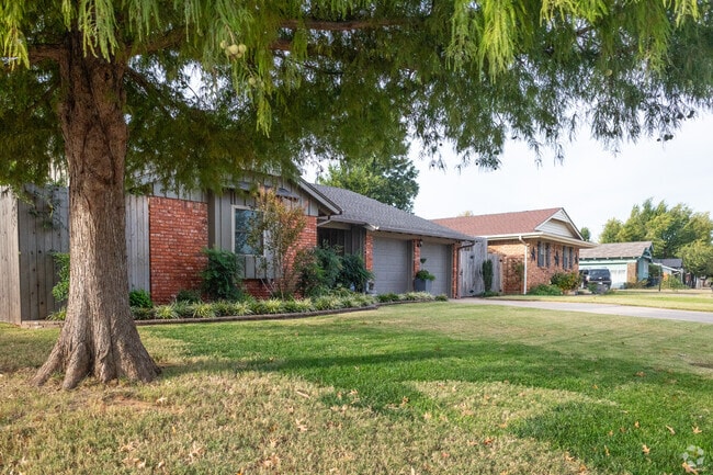 Shaded front yards are common in The Village’s residential streets.