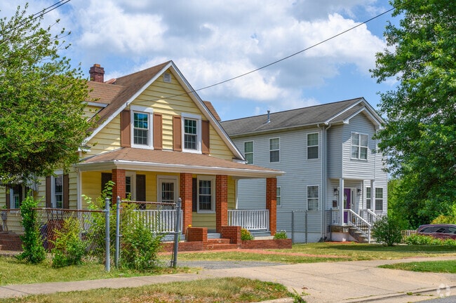 Groveton homes boast inviting porches with sturdy columns and classic charm.