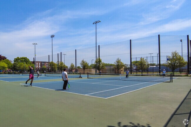 Play a game of tennis with friends at Howard Park in Maplewood.