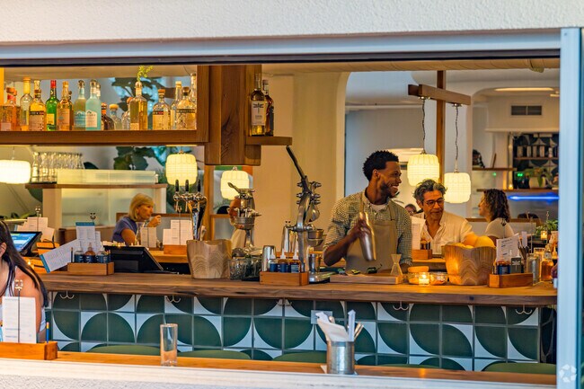 Southwest Coconut Grove head over to CocoWalk for some happy hour at one of many bars.