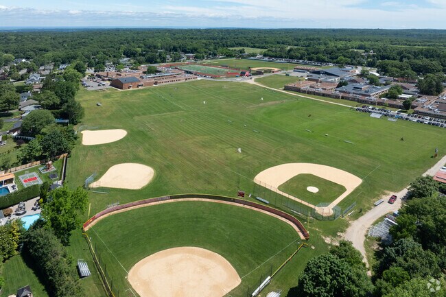 Syosset High School shares sports fields with South Woods Middle School.