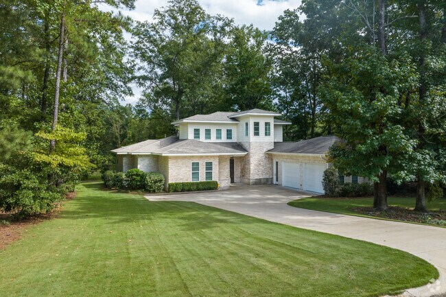 Homes in Cary Woods are backed onto wooded lots.
