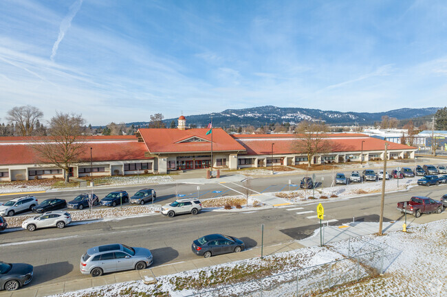The Otis Orchard School has a small parking lot in front of the school.