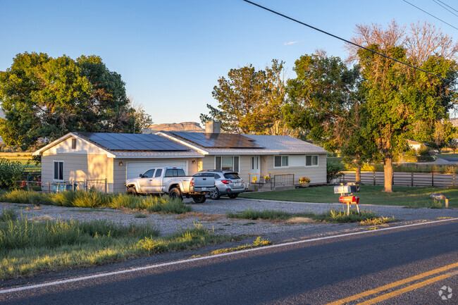 Modest ranch homes can be found in the East Orchard Mesa neighborhood.