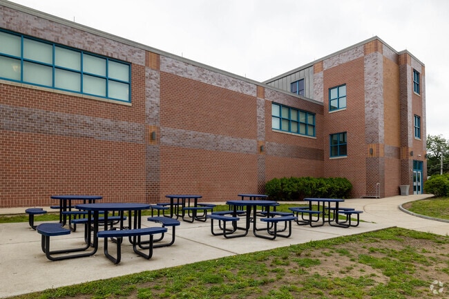 Lots of outdoor seating for students at Manthala George Jr Elementary School In Brockton.