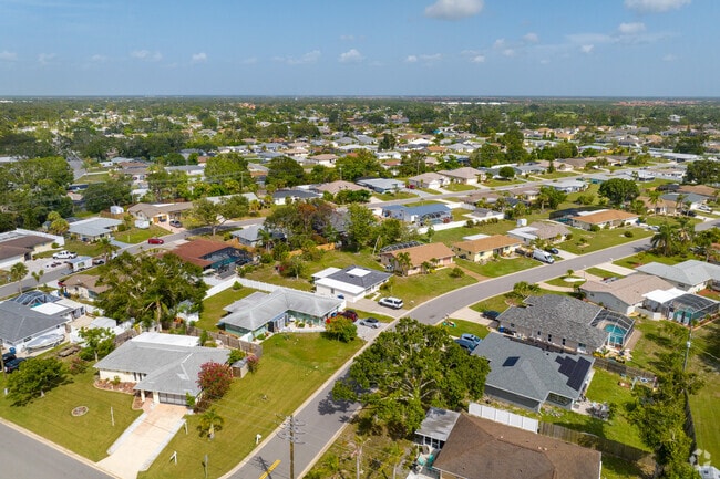 Aerial perspective over Venice East neighborhood showing homes with large lots.