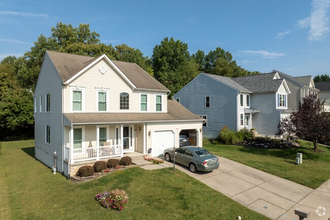 With a welcoming front porch and attached garage, this home fits right into Perryville's neighborhood charms.