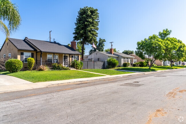 Craftsman homes line quiet residential streets in Ganesha.
