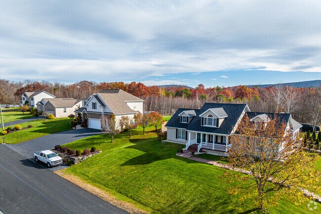 Large colonial homes are common in East Mountain.