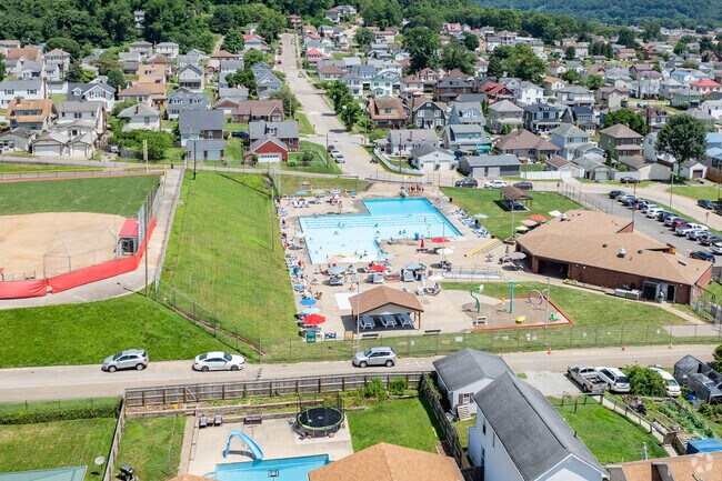 The Swimming pool is always packed during the summer at Memorial Park in Toronto.