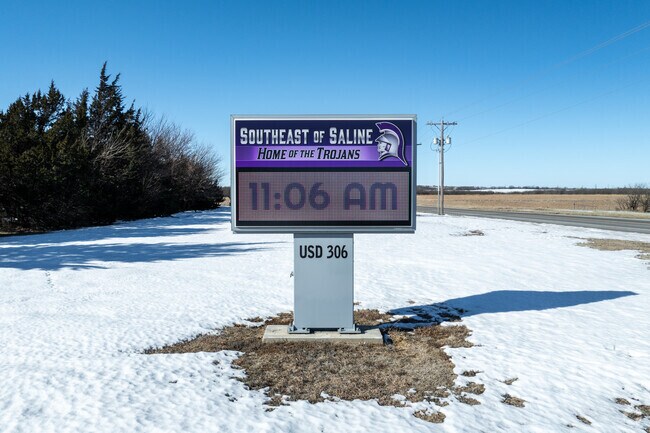 There is a sign for Southeast of Saline near the main road.