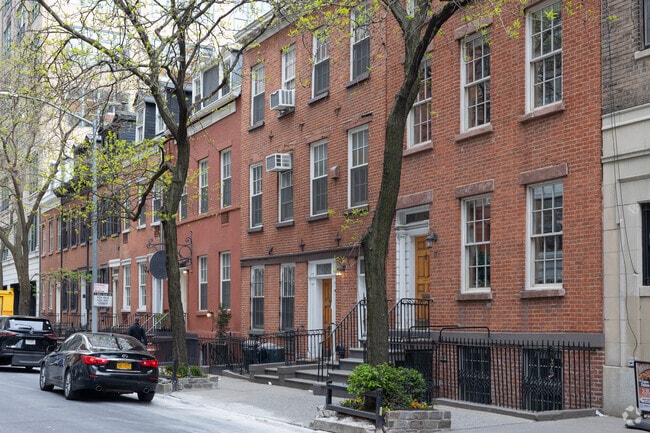 There are Many red brick townhouses throughout SoHo.