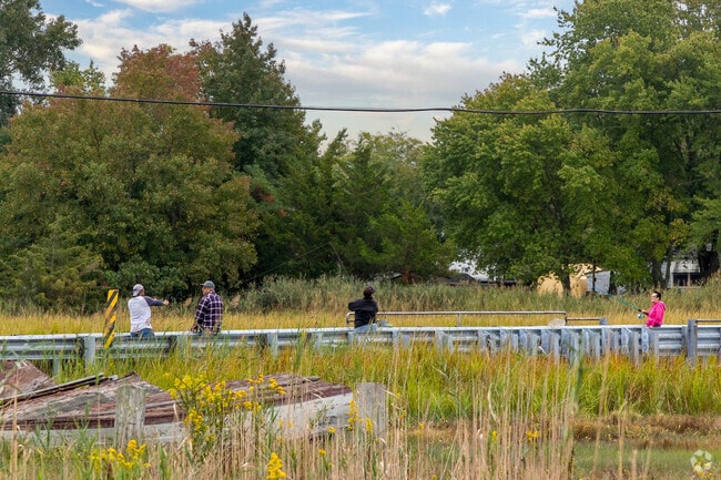 Roadside fishing is a daily ritual for Downe Township residents near the refuge.