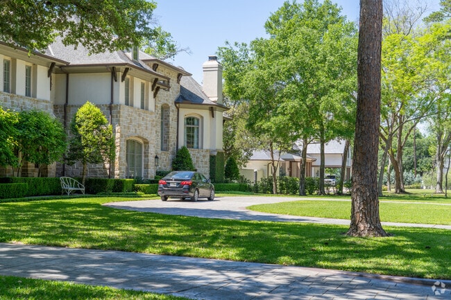 Experience luxury living in Piney Point Village with grand homes on expansive lots.