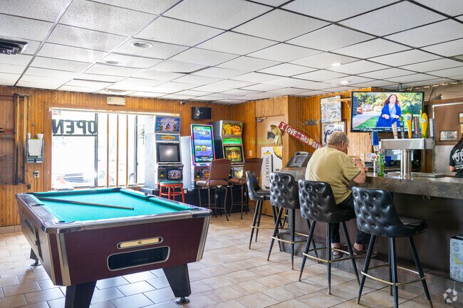 Play pool with friends at Starlite Room in Kenwood Park.