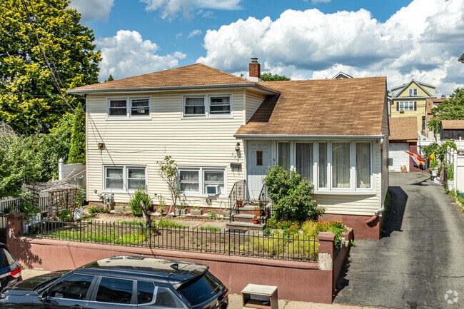 Totowa Section has spacious split-level homes with driveways and small front gardens.