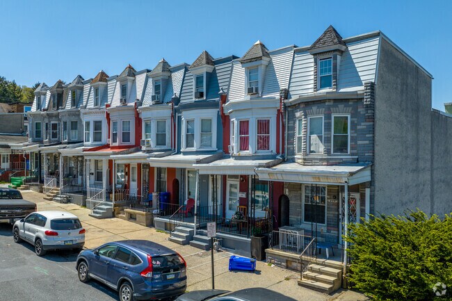 Escape the summer heat in Southeast Community on covered front porches.