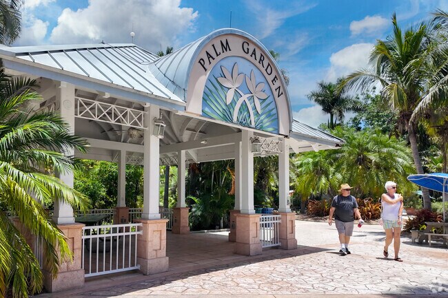 Locals come to enjoy a stroll through the Palm Garden at Florida Botanical Gardens, not far from Del Prado.